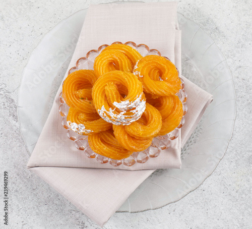 Paneer Jalebi, also Know as Chhena Jalebi, Chhena Jilapi or Zulbia is a Indian Sweet Food photo