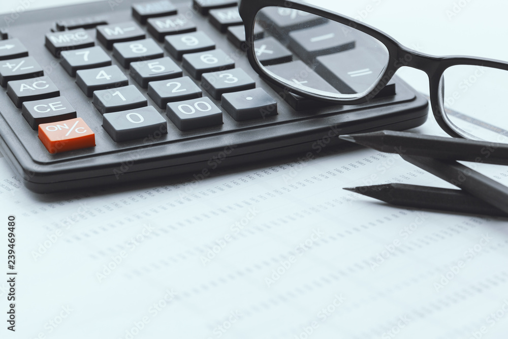 Business still life with calculator on table in office. Business still life with calculator on table in office.