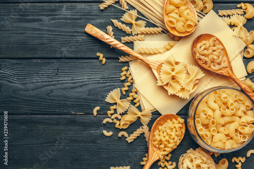 Various pasta on spoons