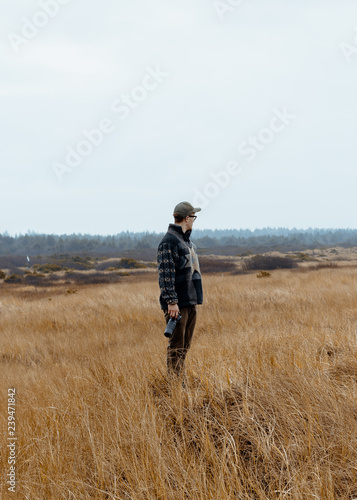 man looking down the field