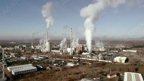 Paper mill. Epic drone shot. Camera rising up. photo