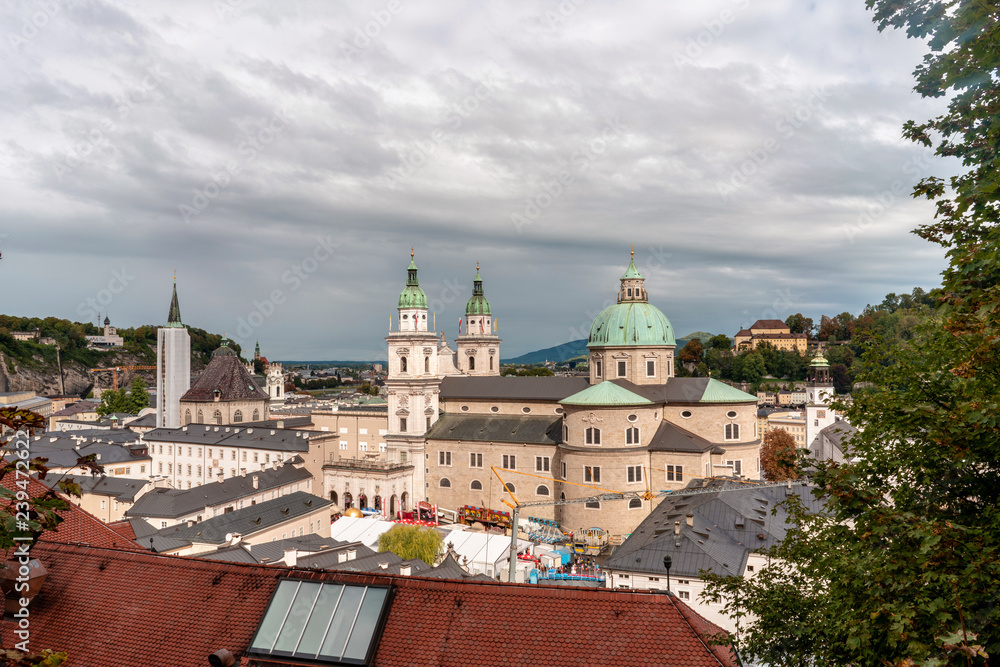 Salzburg old town with after rain clouds above.