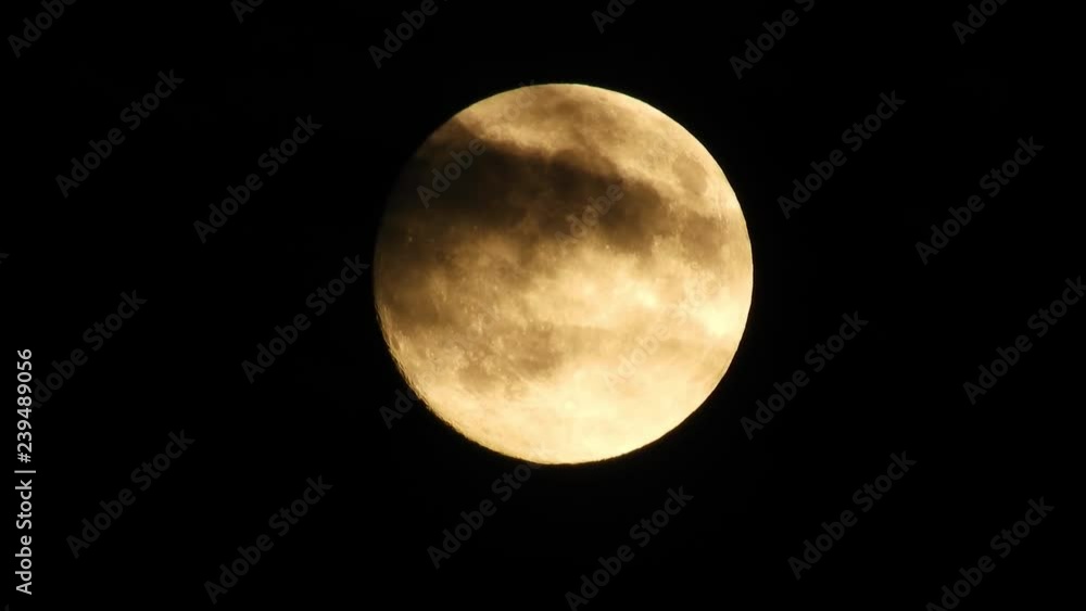 Moon with clouds moving on sky, 4k closeup video at night Moon with clouds moving on sky, 4k closeup video at night