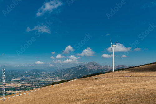 Wind turbine on a mountain ridge in Nothern Italy.