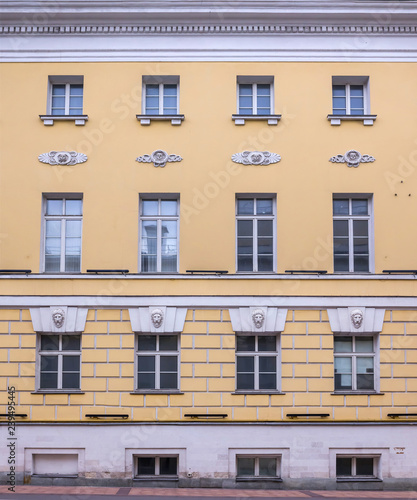 Vintage architecture classical facade of a noble manor in classicism. Front view.