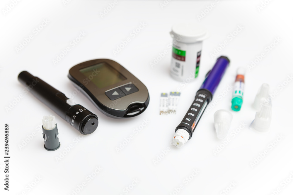 Naklejka premium Diabetic set of lancet with spare needles, glucometer, strips, box of spare strips, pen injector, spare insulin and pen needles isolated on white background