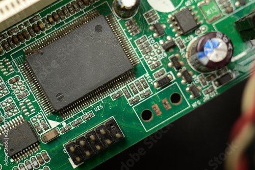 Fototapeta Naklejka Na Ścianę i Meble -  Close-up of electronic chip in desktop computer motherboard circuit.