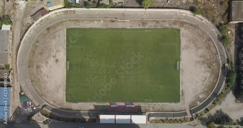 Aerial view of old rundown football field.  Location is Saranda, Albania