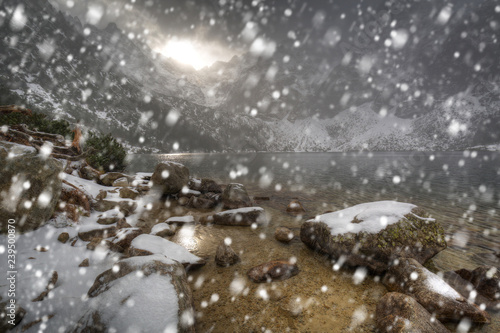 Heavy snowfall at Eye of the Sea lake in Tatra mountains, Poland