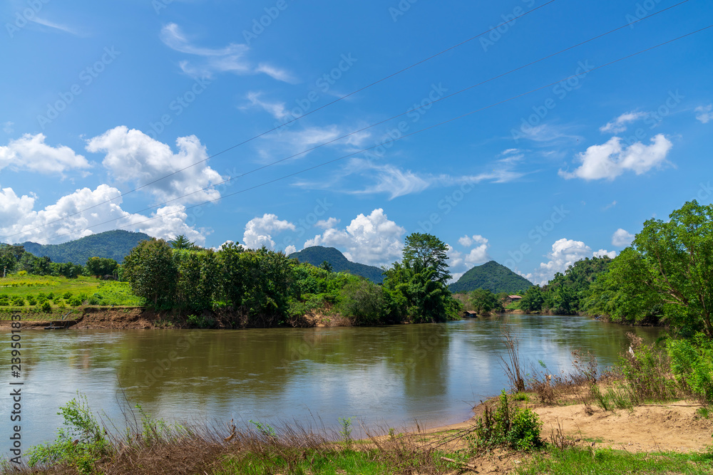Fototapeta premium blue sky river lake mountain wildlife Kanchanaburi Thailand