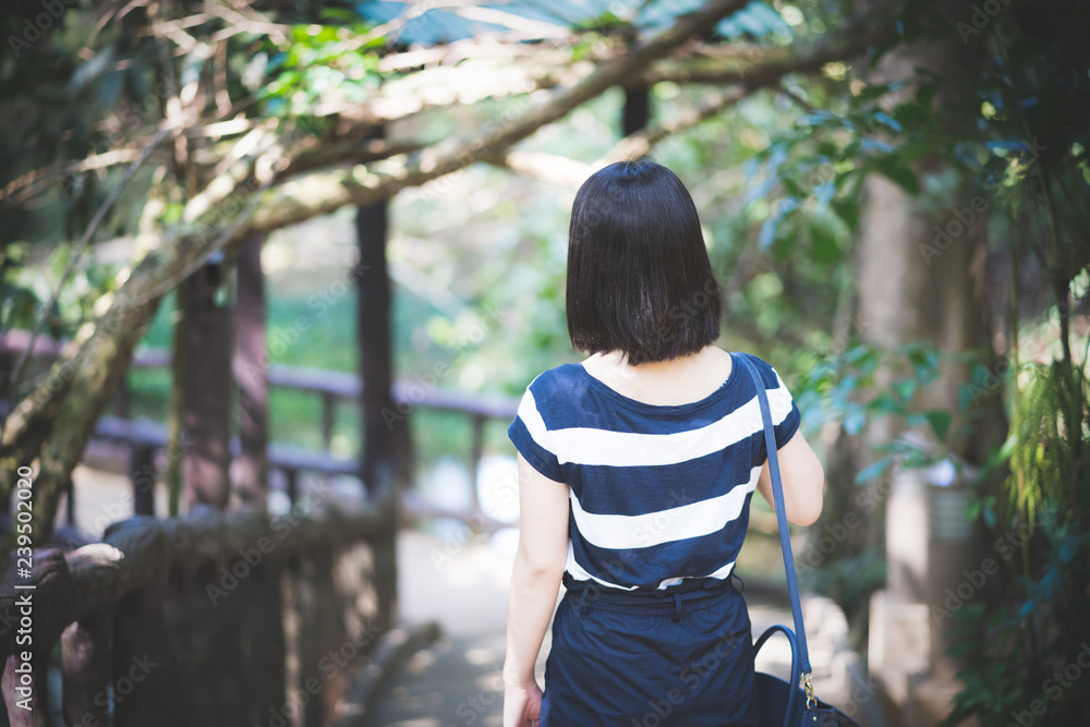 Happy young cute asian Japanese girl hipster backpack women travelling looking at beautiful sky mountains scenery view Happy young cute asian Japanese girl hipster backpack women travelling looking at beautiful sky mountains scenery view