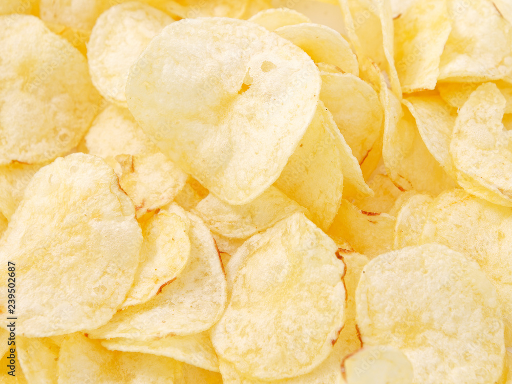 natural potato chips golden on a white background.