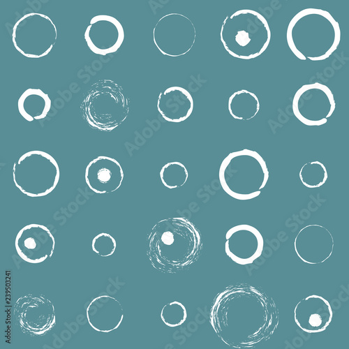 Seamless pattern. Black background and white circles drawn in chalk. Repeating abstract pattern.