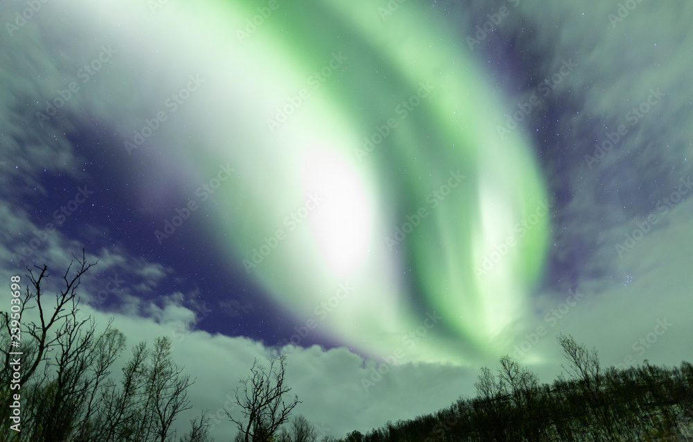 Powerful aurora borealis filling the sky