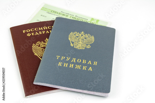 Russian documents. Work book, employment record, a document to record work experience. Russian national passport. Certificate of pension insurance. On white background.