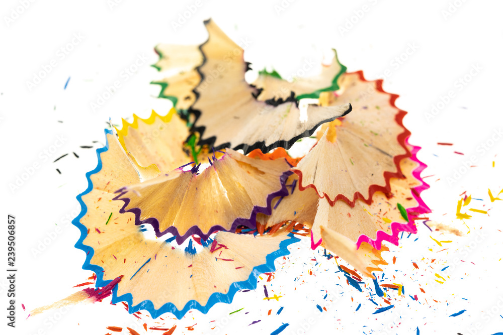 Wooden spiral pencil shavings from sharpener isolated on white background Wooden spiral pencil shavings from sharpener isolated on white background