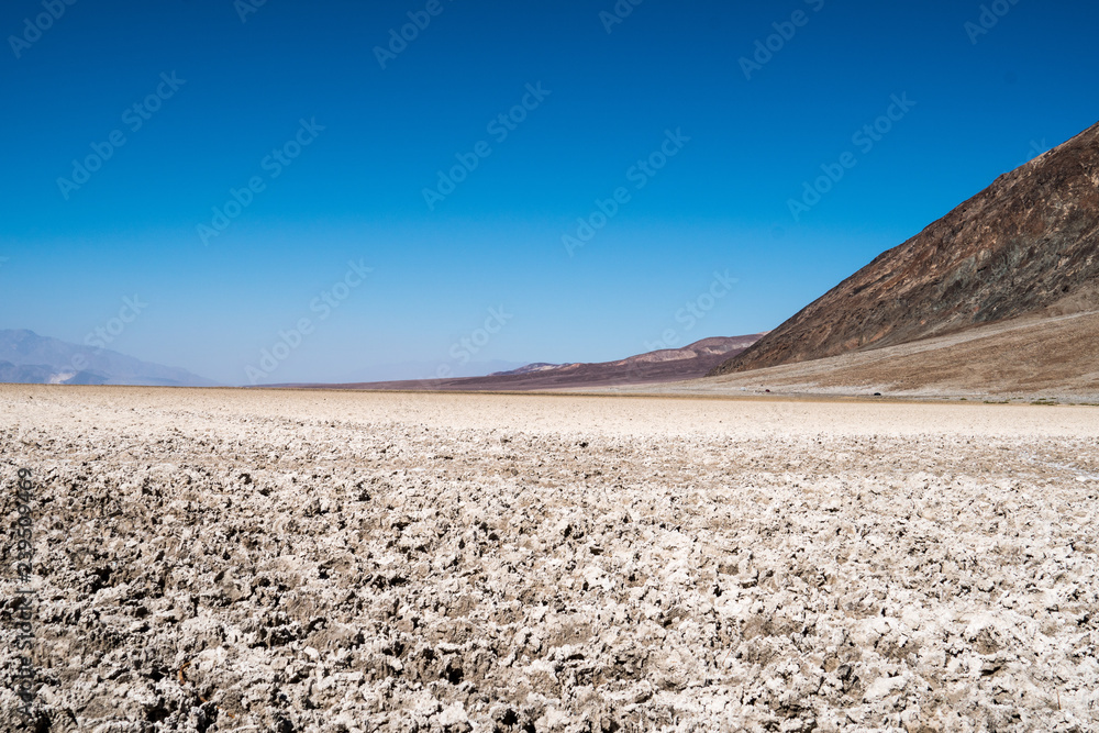 Salt flats at Badwater Basin (lowest point in the Northern Hemisphere) in Death Valley National Park. Useful for a textured background Salt flats at Badwater Basin (lowest point in the Northern Hemisphere) in Death Valley National Park. Useful for a textured background