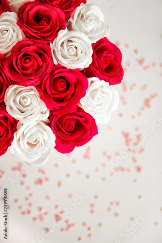 Red and White roses isolated on a white background with space for text