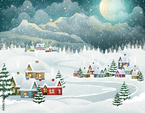 Evening winter village and mountains.