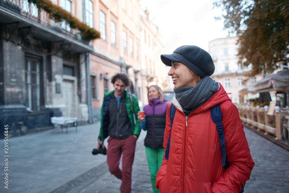 group of tourists walking on the streets of Lviv