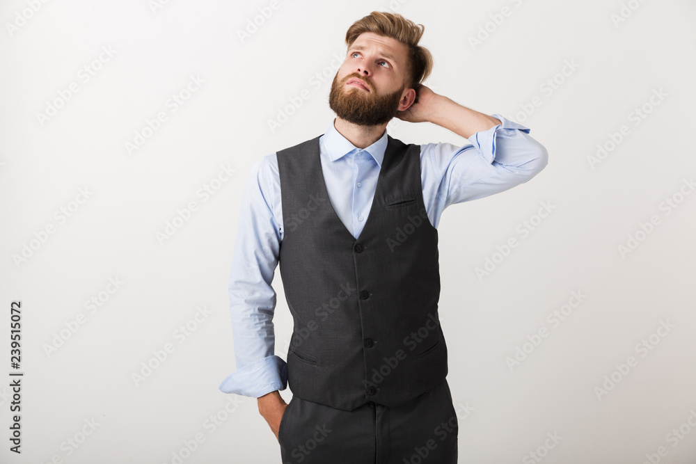 Confident young business man standing Confident young business man standing