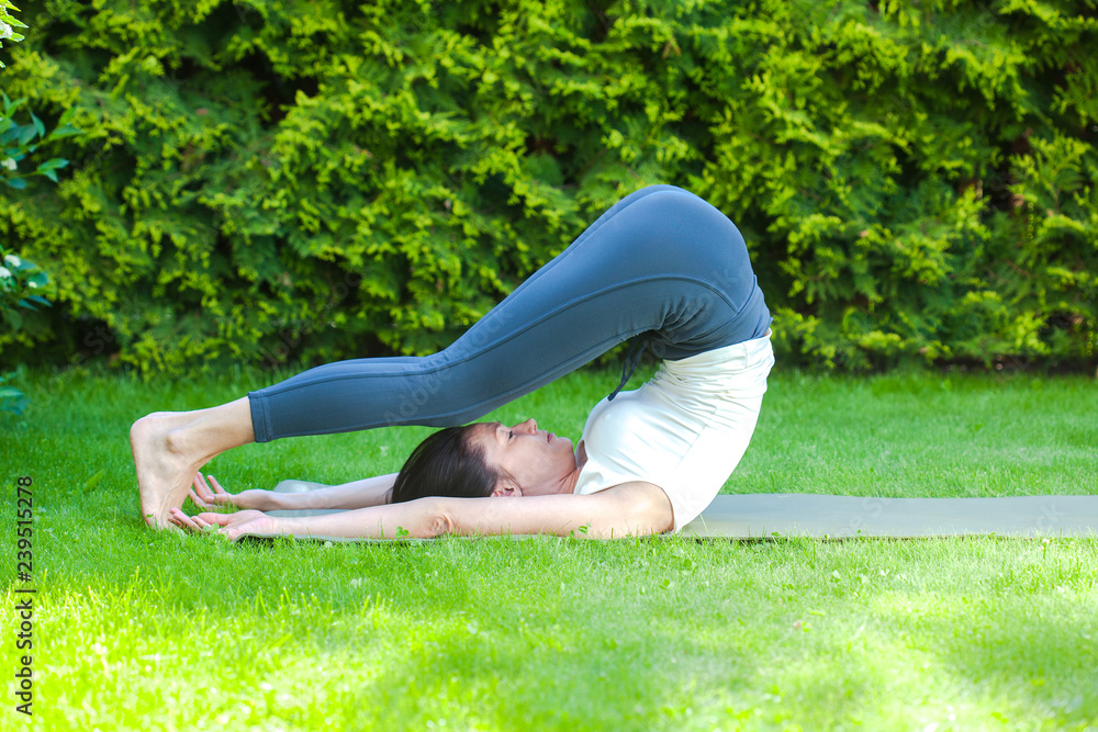 Fototapeta premium beautiful adult woman doing yoga