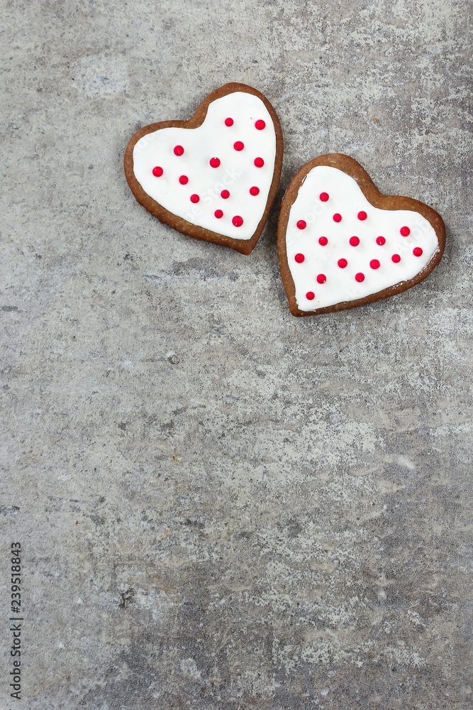 Obraz premium Valentines day background with heart shaped frosted cookies
