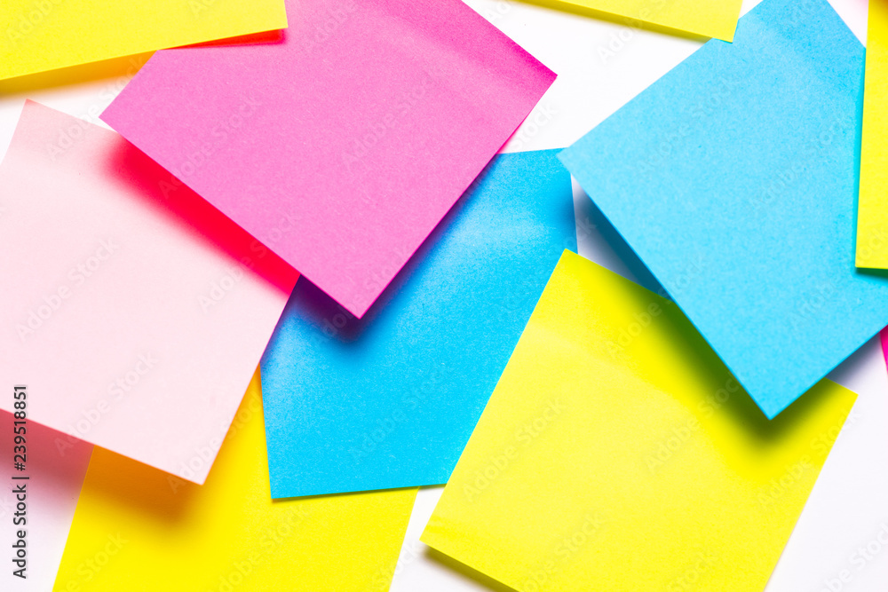 Many colorful sticky notes on white background
