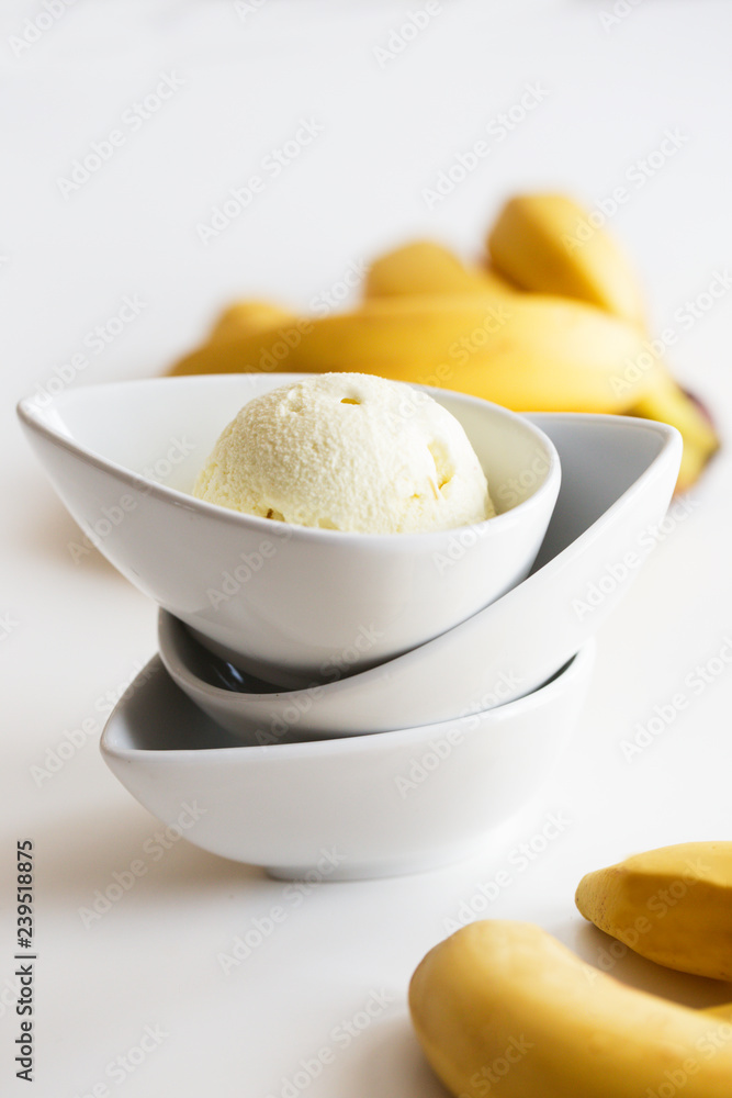 Homemade Ice Cream. delicious ice cream and bananas on a white background. Homemade Ice Cream. delicious ice cream and bananas on a white background.