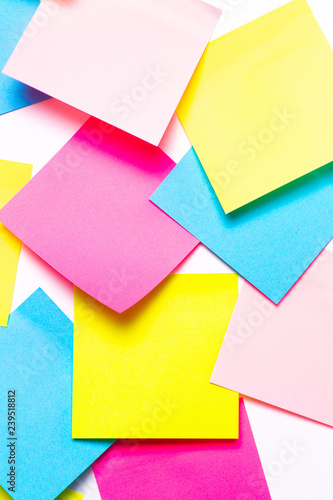 Many colorful sticky notes on white background