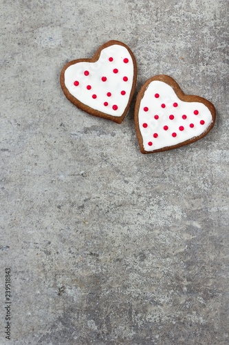 Valentines day background with heart shaped frosted cookies