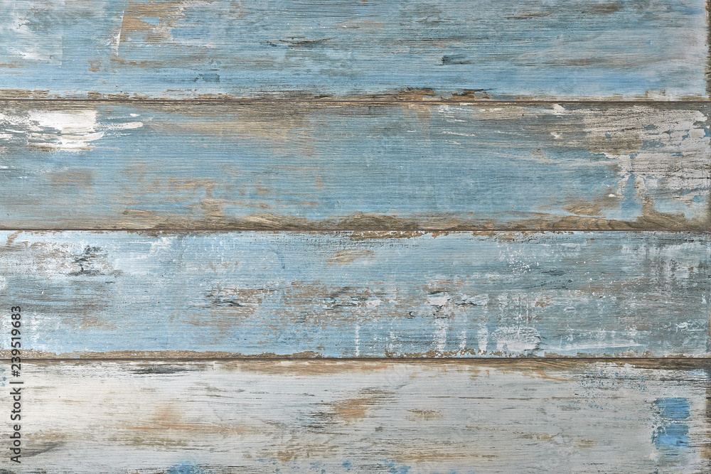Fototapeta premium Blue grungy textured plank background
