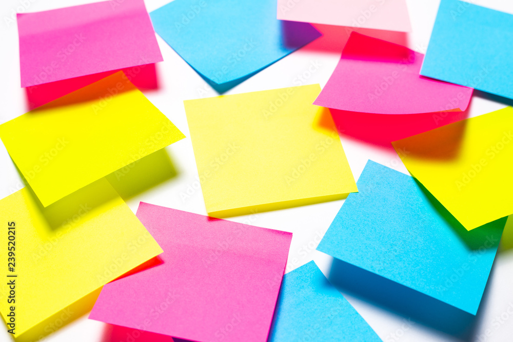 Many colorful sticky notes on white background Many colorful sticky notes on white background