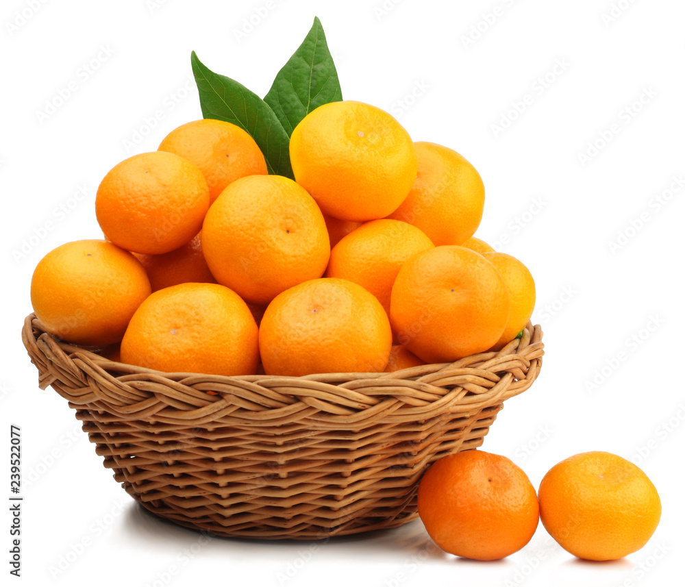Fresh tangerines in a basket isolated on white Fresh tangerines in a basket isolated on white