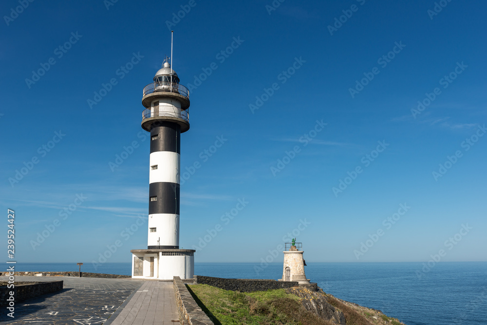 Lighthouse in San Agustin Cape, Asturias, Spain Lighthouse in San Agustin Cape, Asturias, Spain