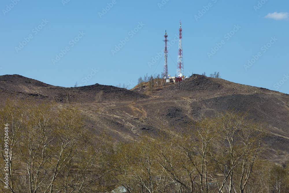 Antennas of radio and telephone communication on the top of the hill.