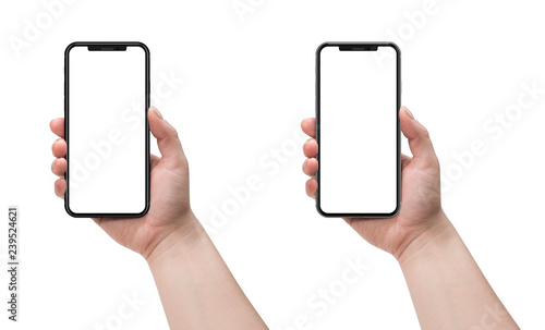 Woman holding smartphone with blank screen. photo