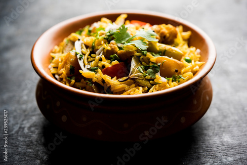 Masala Rice or masale bhat - is a spicy vegetable fried rice / biryani or Pulav usually made during wedding occassions in maharashtra, India photo