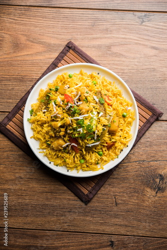 Masala Rice or masale bhat - is a spicy vegetable fried rice / biryani or Pulav usually made during wedding occassions in maharashtra, India photo