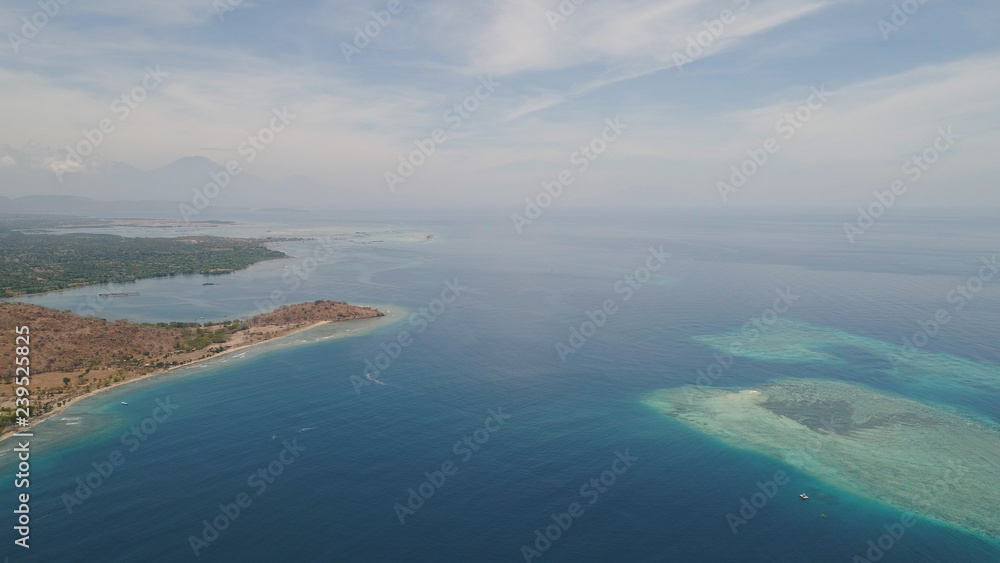 sea coast with tropical beach. aerial seascape tropical landscape, sea, boats on the surface water. Bali,Indonesia, travel concept. sea coast with tropical beach. aerial seascape tropical landscape, sea, boats on the surface water. Bali,Indonesia, travel concept.