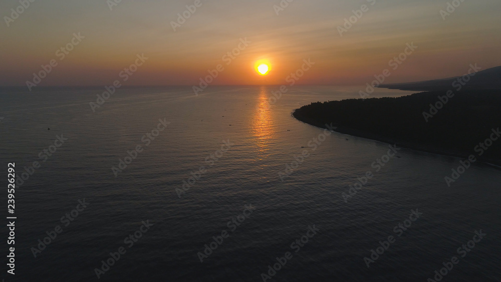 aerial view sunrise over ocean. seascape colorful sunrise over sea at tropical resort