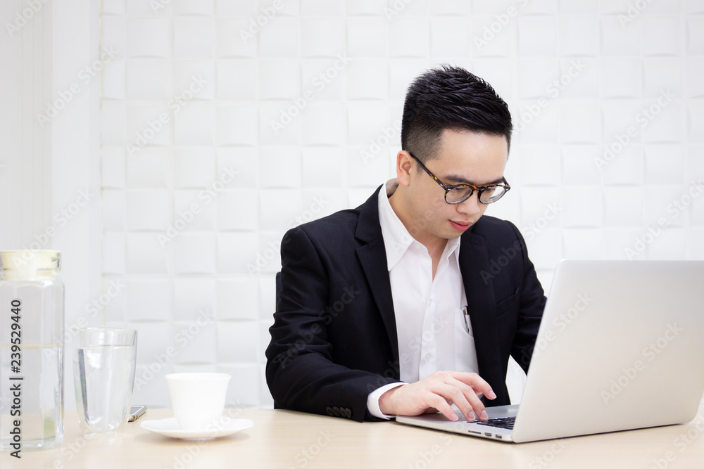 Portrait of Asian smart young CEO in the office. Portrait of Asian smart young CEO in the office.