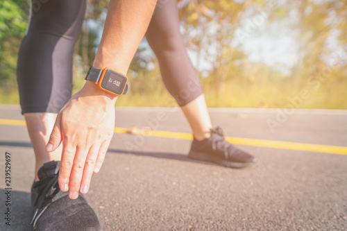 Women exercise in the morning with SmartWatch.