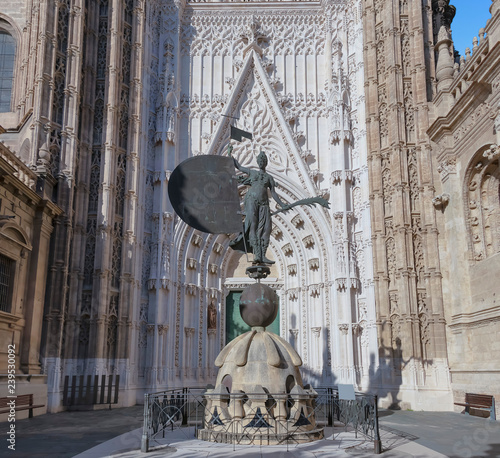 Door of the Prince (Puerta del Principe) with Statue of the Giraldillo, Cathedral of Saint Mary of the See (Catedral de Santa Maria de la Sede), or Seville Cathedral, Sevilla, Andalusia, Spain photo