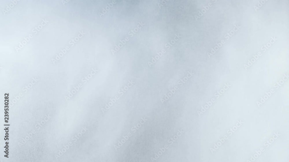 Water mist, steam cloud in slow-motion against black background. Water mist, steam cloud in slow-motion against black background.