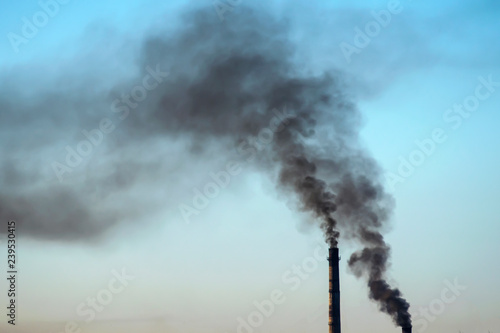 pipe of coal boiler smokes black smoke