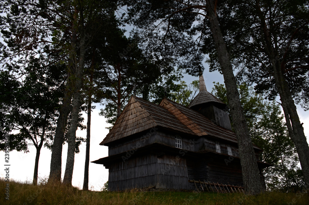 Old wooden Ukrainian Church stands high in the mountains