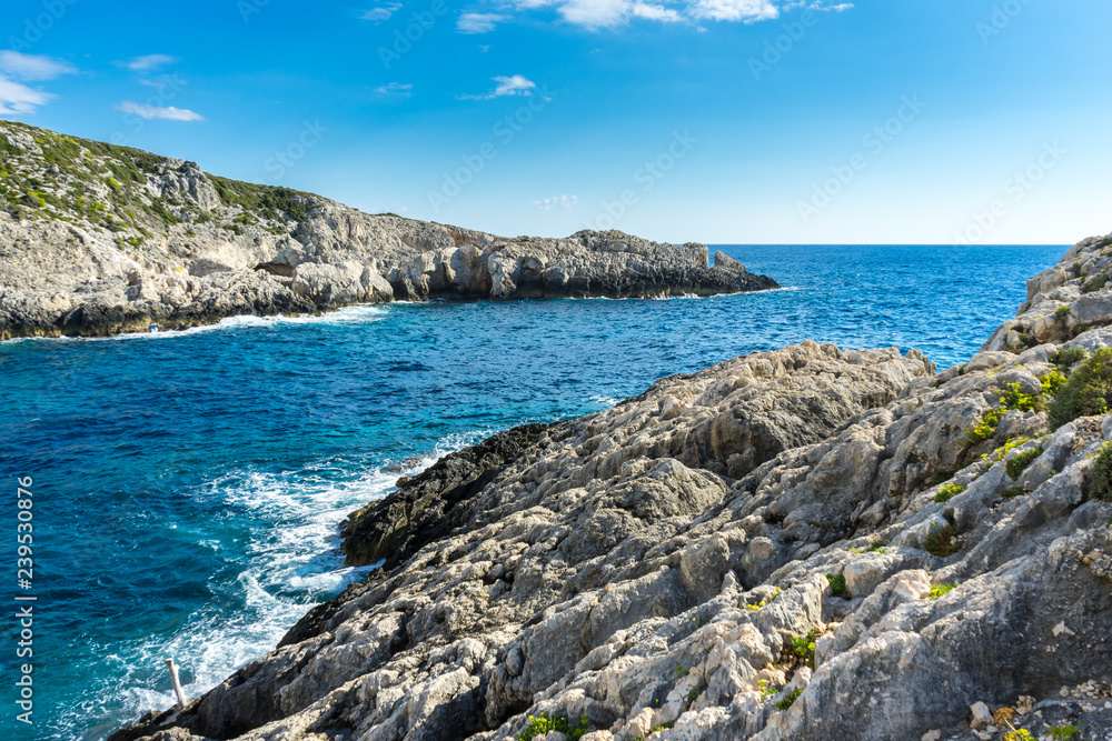 Greece, Zakynthos, Rough rocks of Porto Limnionas bay and open water