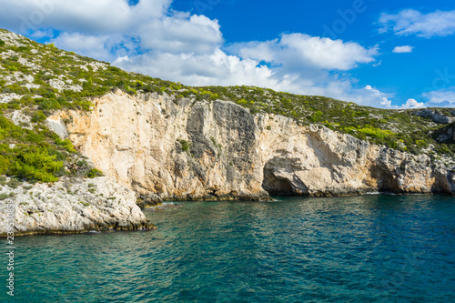 Greece, Zakynthos, Abrupt white chalk rock cliffs of Porto Limnionas bay