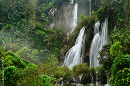 Great waterfall in Thailand. Beautiful waterfall in the green forest. Waterfall in tropical forest at Umpang National park, Tak, Thailand.